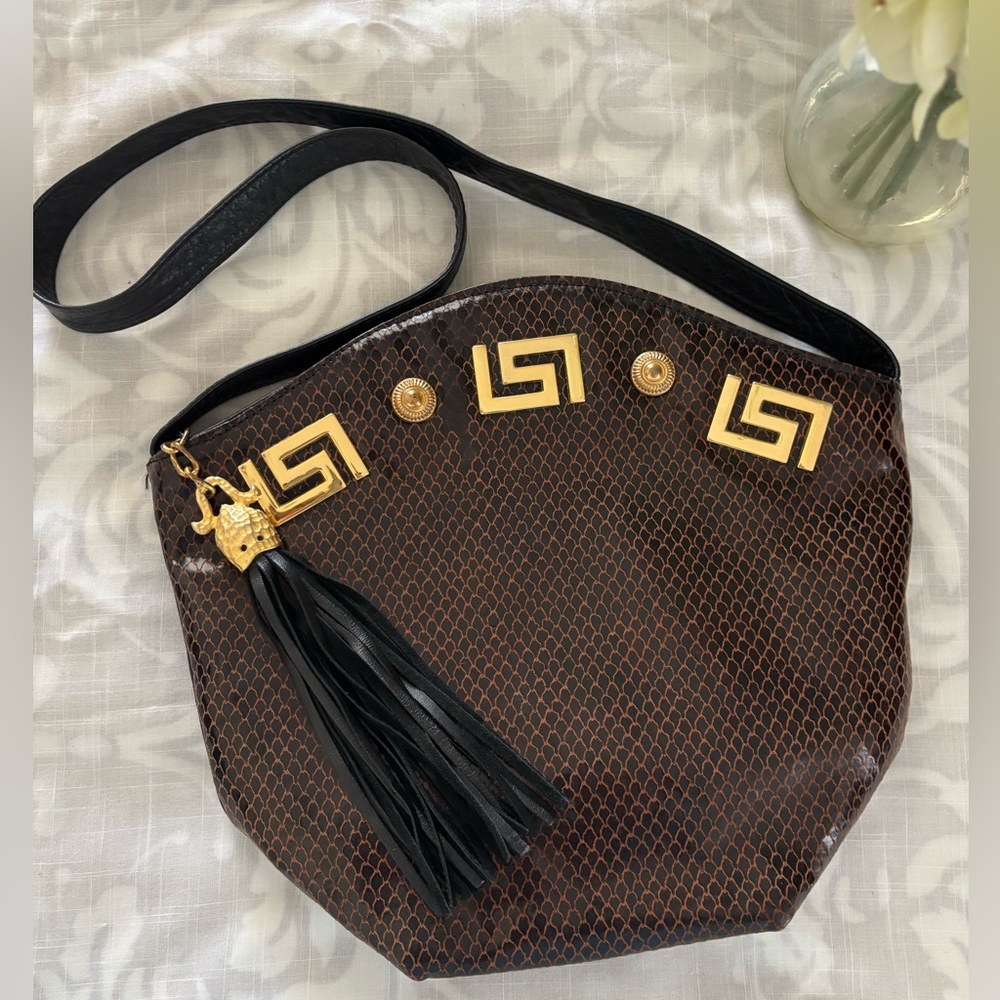 Elegant Brown and Black Tote Bag with Gold Accents
